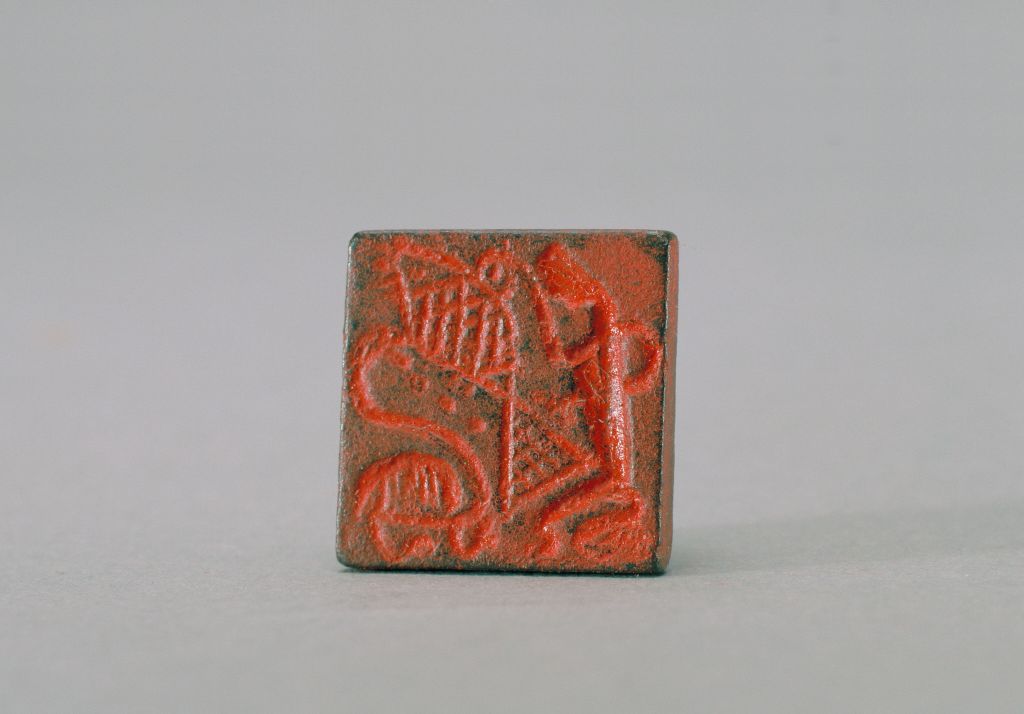 张弘捕鱼图案铜印印面